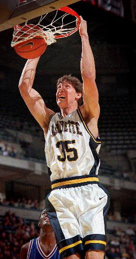 Marquette Golden Eagles (35) John Mueller slms dunks against the Saint Louis
University Billikens during Wednesday's game, January 5, 2000 at the Bradley...